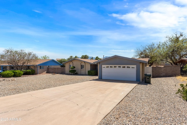 2232 Carmelita Dr, Sierra Vista, AZ 85635 - ranch-style home featuring fence, a garage, and concrete driveway