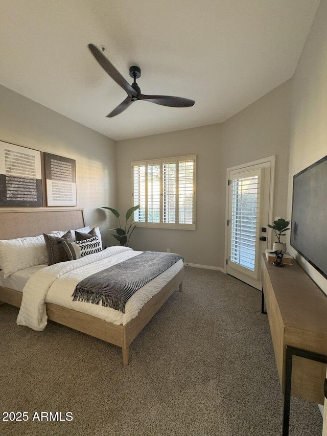 carpeted bedroom featuring baseboards, ceiling fan, and access to exterior