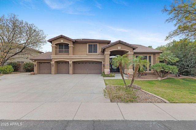 view of front of house featuring driveway, a front lawn, an attached garage, and stucco siding