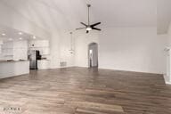 unfurnished living room featuring wood finished floors