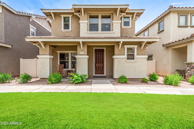 5840 E Holmes Ave, Mesa, AZ 85206 - view of front of house featuring covered porch, a front lawn, and stucco siding