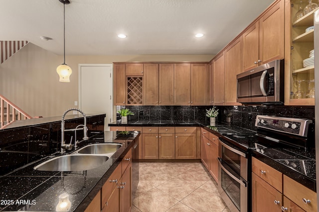 5840 E Holmes Ave, Mesa, AZ 85206 - kitchen with appliances with stainless steel finishes, a sink, decorative backsplash, hanging light fixtures, and light tile patterned floors