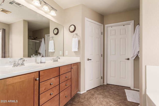 5840 E Holmes Ave, Mesa, AZ 85206 - full bath with a stall shower, double vanity, a tub to relax in, and baseboards