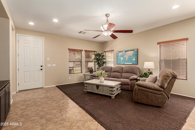 5840 E Holmes Ave, Mesa, AZ 85206 - living area with a ceiling fan, light tile patterned floors, recessed lighting, and baseboards
