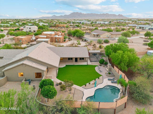 drone / aerial view featuring a mountain view