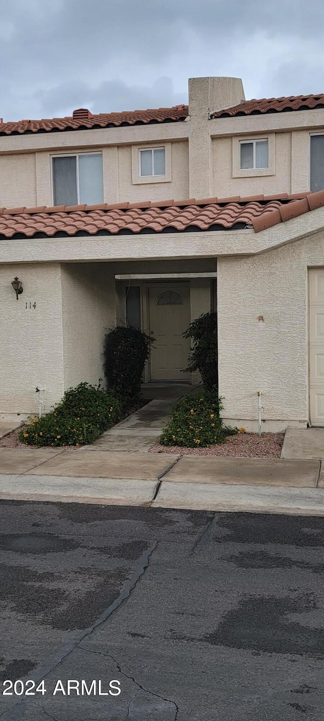 16021 N 30th St Unit 113, Phoenix, AZ 85032 - view of property with a tile roof