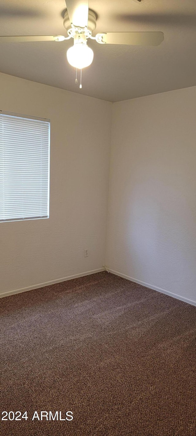 16021 N 30th St Unit 113, Phoenix, AZ 85032 - carpeted empty room featuring ceiling fan and baseboards