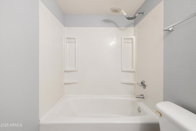 full bathroom with toilet and bathtub / shower combination