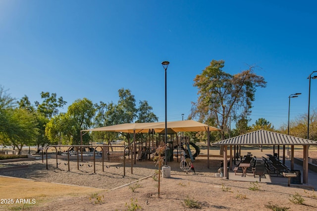 view of property's community featuring a gazebo and playground community