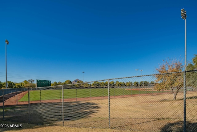view of home's community with fence