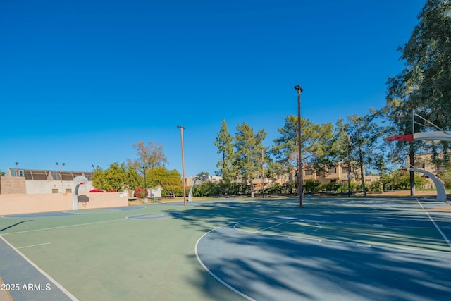 view of sport court with community basketball court