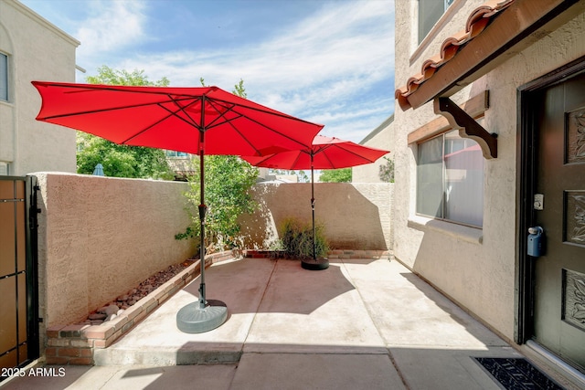 view of patio / terrace with fence