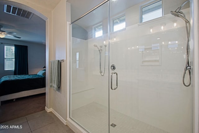 full bath featuring visible vents, ensuite bathroom, a stall shower, ceiling fan, and tile patterned flooring