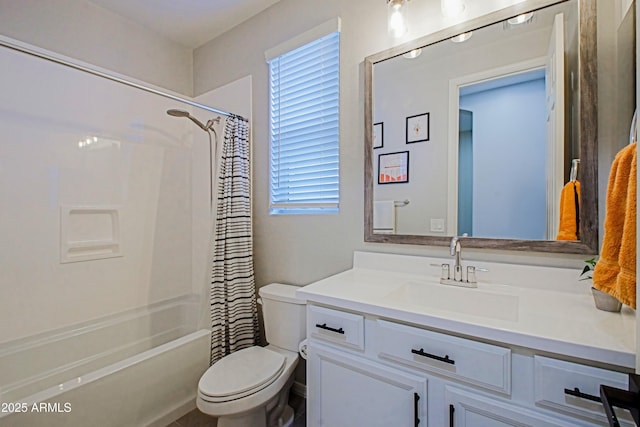 bathroom with shower / bath combination with curtain, vanity, and toilet