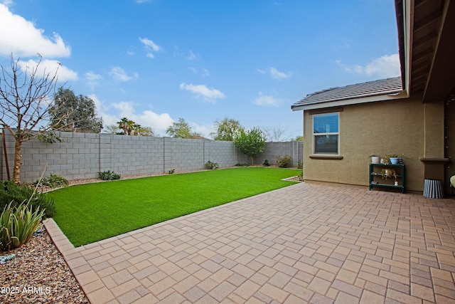 view of patio with a fenced backyard