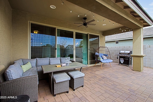 view of patio / terrace with outdoor lounge area, area for grilling, fence, and a ceiling fan