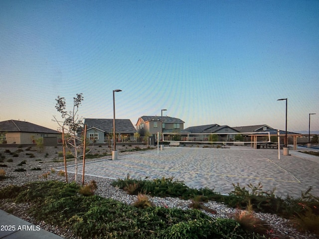 view of community with a residential view and volleyball court