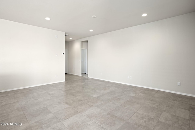 1343 W Hess Ave, Coolidge, AZ 85128 - spare room with baseboards and recessed lighting