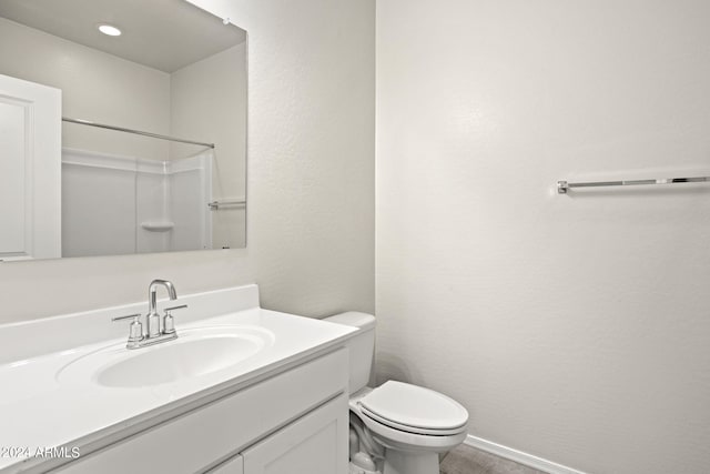 1343 W Hess Ave, Coolidge, AZ 85128 - full bath featuring toilet, a shower, vanity, baseboards, and a textured wall