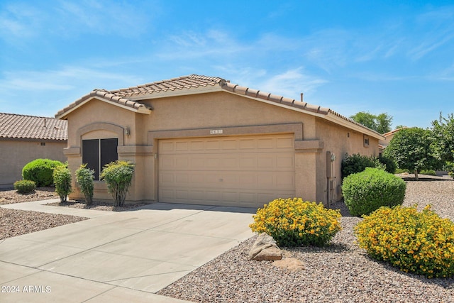 view of front of house with a garage