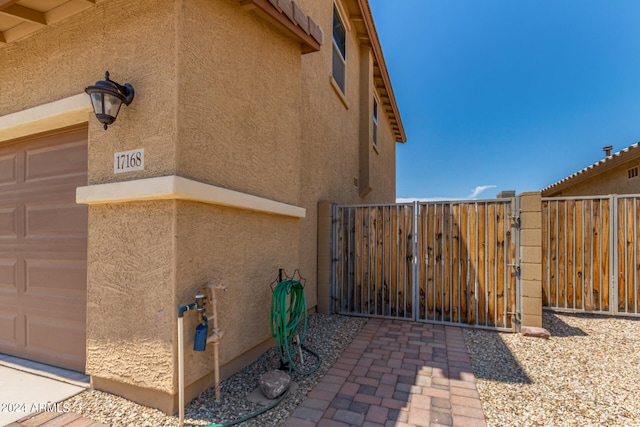 view of side of property featuring a garage