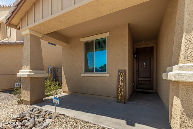 doorway to property featuring a patio