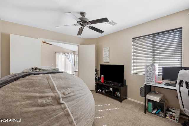 bedroom with light colored carpet and ceiling fan