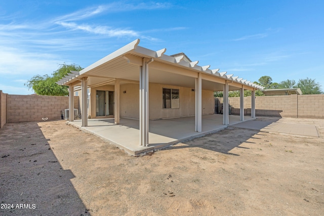 back of property featuring a patio area