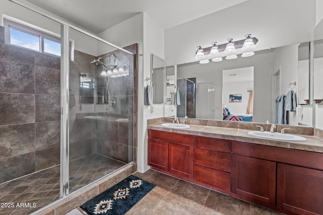 bathroom with vanity and an enclosed shower