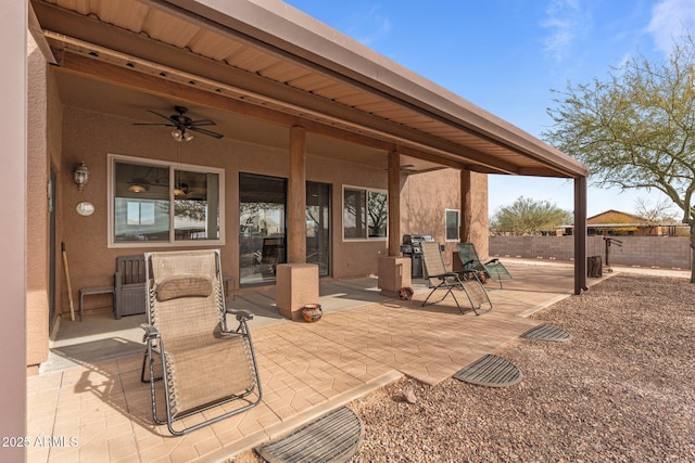 view of patio / terrace featuring ceiling fan