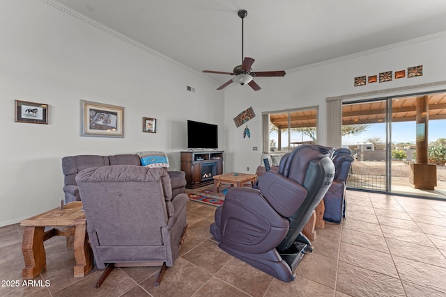 tiled living room featuring ceiling fan and ornamental molding