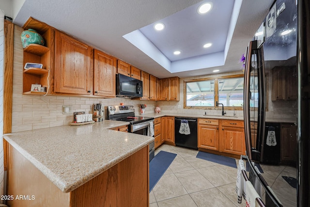 14412 N 39th Ave, Phoenix, AZ 85053 - kitchen with black appliances, decorative backsplash, a sink, open shelves, and a peninsula