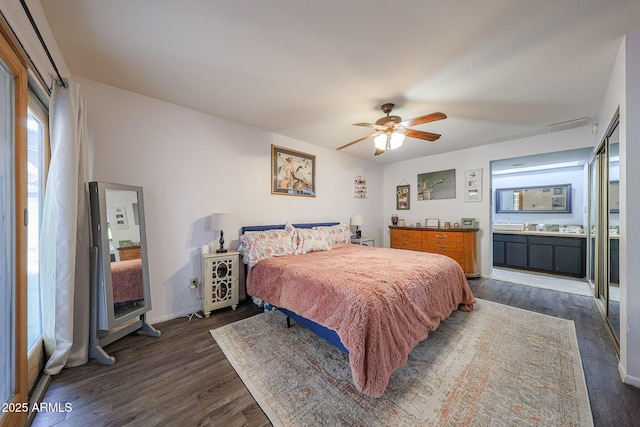 14412 N 39th Ave, Phoenix, AZ 85053 - bedroom featuring dark wood-style floors, ensuite bath, and ceiling fan