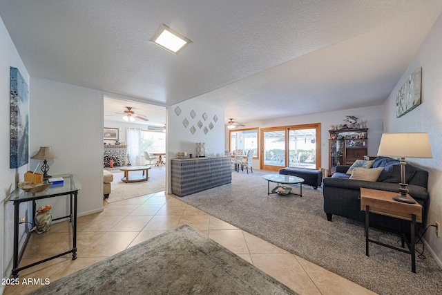 14412 N 39th Ave, Phoenix, AZ 85053 - living area featuring ceiling fan, tile patterned floors, plenty of natural light, and a textured ceiling