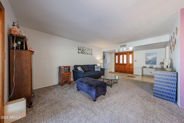 14412 N 39th Ave, Phoenix, AZ 85053 - carpeted living area with baseboards