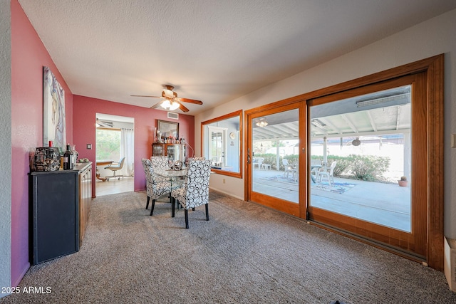 14412 N 39th Ave, Phoenix, AZ 85053 - carpeted dining area featuring ceiling fan and a textured ceiling