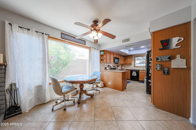14412 N 39th Ave, Phoenix, AZ 85053 - dining space featuring a ceiling fan, plenty of natural light, and light tile patterned floors