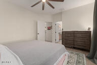 14687 W Amelia Ave, Goodyear, AZ 85395 - bedroom featuring ceiling fan