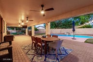 14687 W Amelia Ave, Goodyear, AZ 85395 - view of patio with outdoor dining area and a ceiling fan