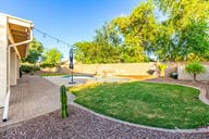 14687 W Amelia Ave, Goodyear, AZ 85395 - view of green lawn