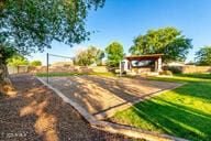14687 W Amelia Ave, Goodyear, AZ 85395 - view of home's community featuring a lawn