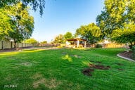 14687 W Amelia Ave, Goodyear, AZ 85395 - view of green lawn