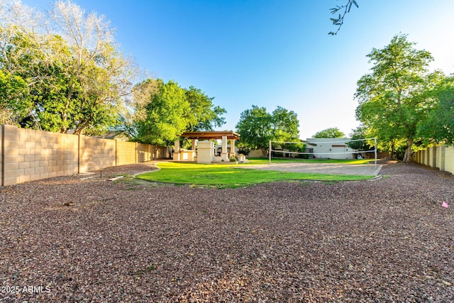 14687 W Amelia Ave, Goodyear, AZ 85395 - fenced backyard featuring volleyball court
