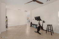 14687 W Amelia Ave, Goodyear, AZ 85395 - exercise room with ceiling fan