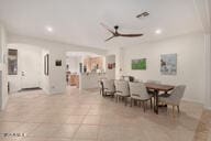 14687 W Amelia Ave, Goodyear, AZ 85395 - dining room with a ceiling fan and recessed lighting