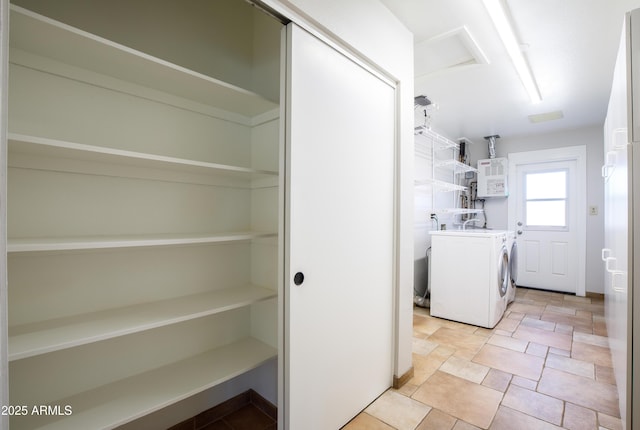 washroom with laundry area and separate washer and dryer