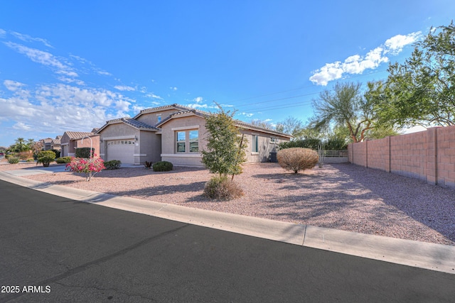 ranch-style home with a garage