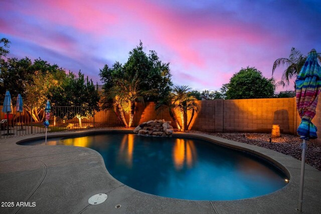 9566 N 83rd Dr, Peoria, AZ 85345 - view of swimming pool with a patio, a fenced backyard, and a fenced in pool