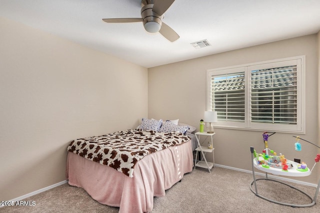 9566 N 83rd Dr, Peoria, AZ 85345 - carpeted bedroom with baseboards, visible vents, and ceiling fan