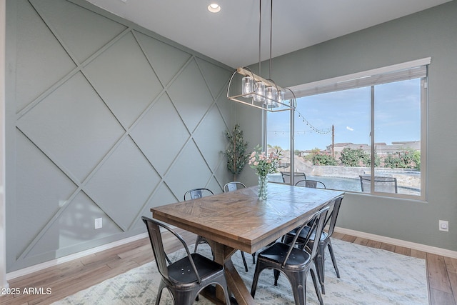 22771 N 98th Dr, Peoria, AZ 85383 - dining room with baseboards, a chandelier, wood finished floors, and recessed lighting